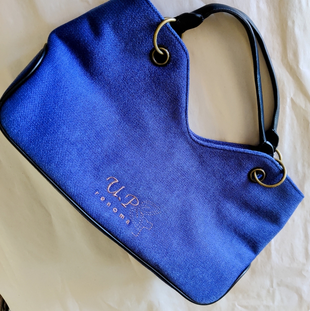 An UP Renoma icy blue handbag